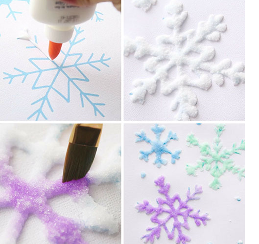 Snowflake paintings made with glue, salt and watercolor paint