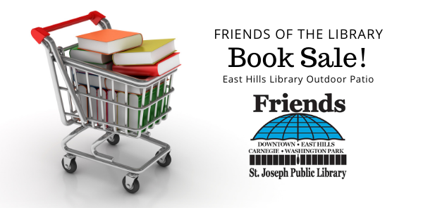 Shopping cart full of books advertising the Friends Patio Book Sale