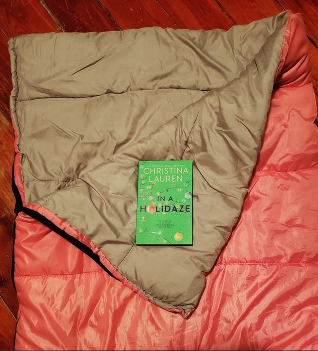book on a sleeping bag